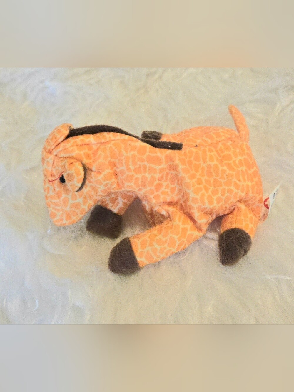 Ty Teenie Beanie Babies Twigs the Giraffe plush, originally released in 1993.